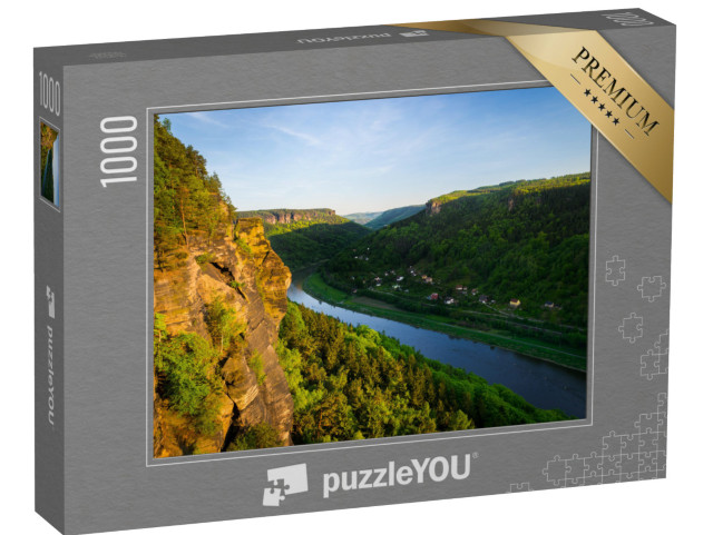 Puzzle 1000 pezzi „Scogliere di arenaria e foreste al sole della sera, Elba“