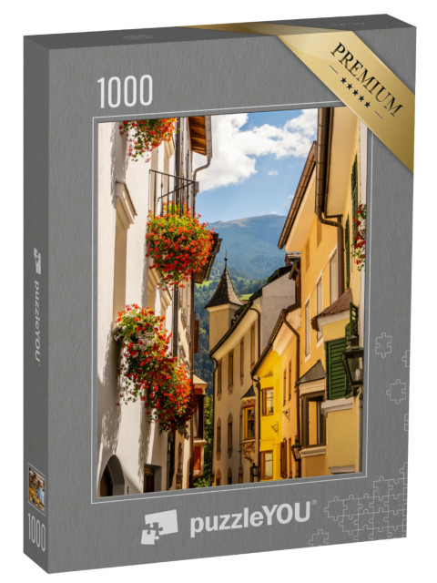 Puzzle 1000 pezzi „Il centro storico di Bressanone in una soleggiata giornata estiva, Alto Adige, Italia“