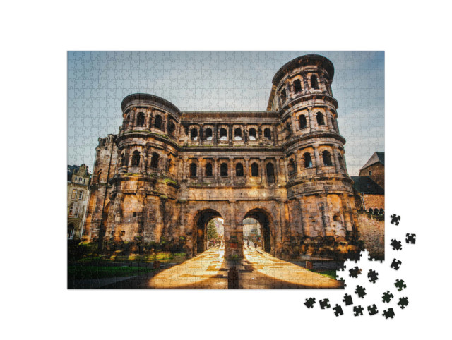 Puzzle 1000 pezzi „La Porta Nigra nella città di Treviri, in Germania, patrimonio dell'umanità dell'UNESCO“