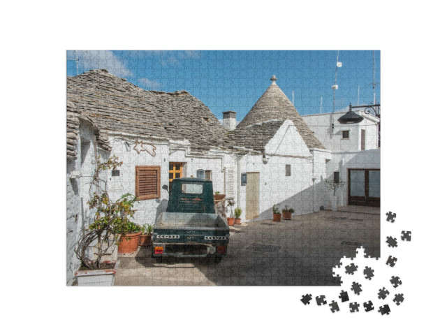 Puzzle 1000 pezzi „Iconiche case residenziali nello storico quartiere dei trulli di Alberobello, Italia“