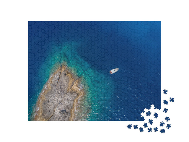 Puzzle 1000 pezzi „Vista aerea di un'isola deserta con una barca bianca costa rocciosa dell'isola di Zannone, vicino a Ponza“