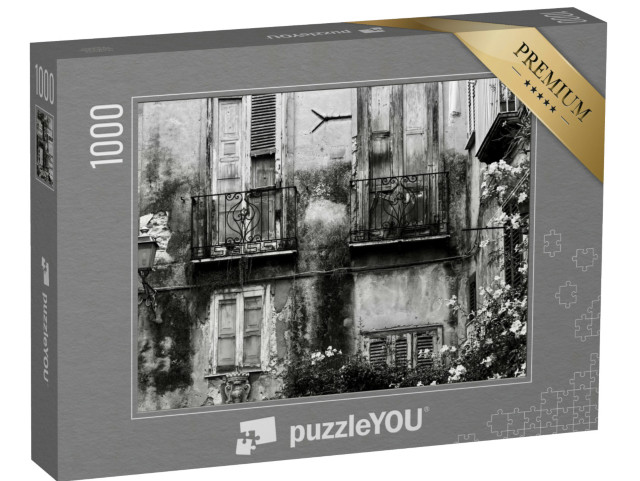 Puzzle 1000 pezzi „La facciata di un edificio sulle strade di Tropea, in Calabria.“
