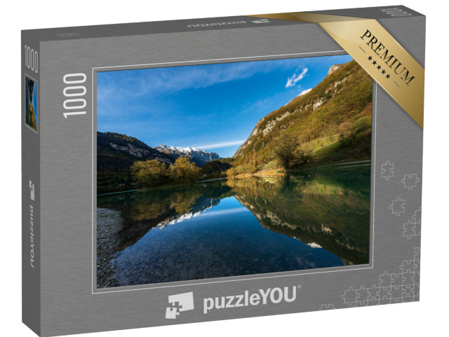 Puzzle 1000 pezzi „Lago di Tenno in autunno, piccolo e bellissimo lago con riflessi nelle Alpi italiane, Trentino-Alto Adige“