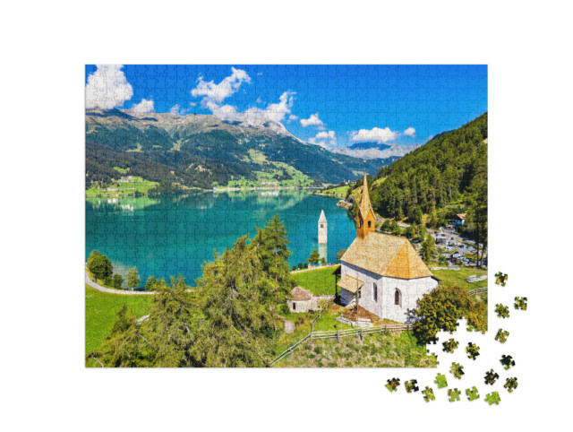 Puzzle 1000 pezzi „Cappella di Sant'Anna e campanile sommerso a Curon, Val Venosta“