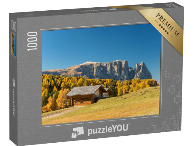 Puzzle 1000 pezzi „Alpeggio autunnale dell'Alpe di Siusi con vista sul massiccio dello Sciliar, rifugio, Sciliar, Dolomiti“