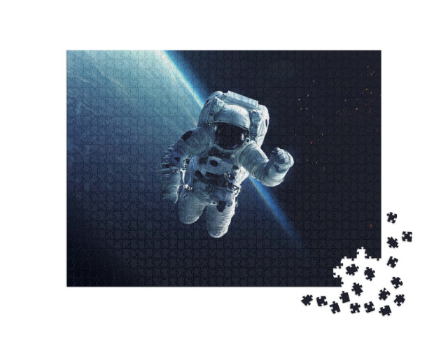 Puzzle 1000 pezzi „Astronauta in passeggiata spaziale“