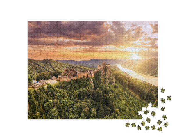 Puzzle 1000 pezzi „Bellissimo paesaggio con le rovine del castello di Aggstein e il Danubio in Austria“