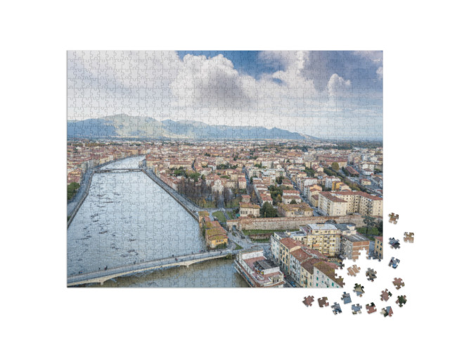 Puzzle 1000 pezzi „Veduta aerea del fiume Arno durante la piena, Pisa, Italia.“