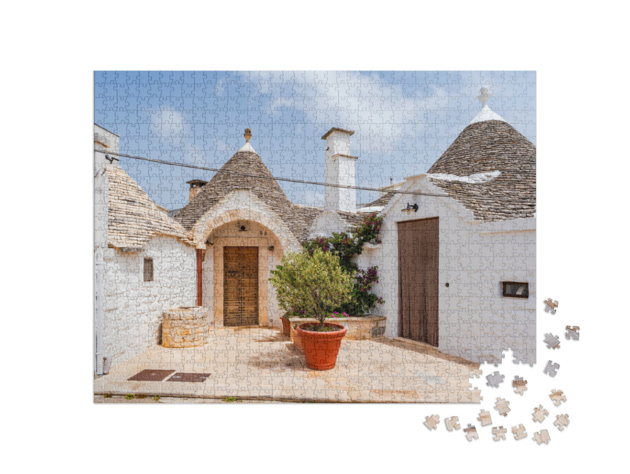Puzzle 1000 pezzi „Famosi trulli storici in pietra a secco con tetti conici ad Alberobello“