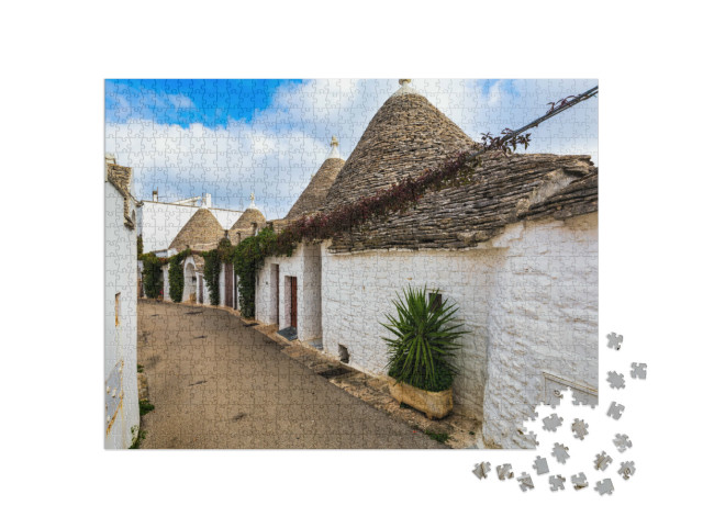 Puzzle 1000 pezzi „Le tradizionali case a trulli nella città di Alberobello, Puglia, Italia“