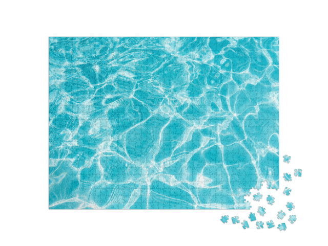 Puzzle 1000 pezzi „Increspatura dell'acqua della piscina con riflesso del sole“
