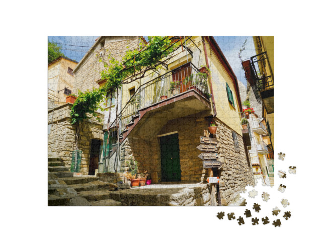 Puzzle 1000 pezzi „Castelmezzano, l'antico borgo immerso nei tipici panorami delle Dolomiti Lucane, Potenza“