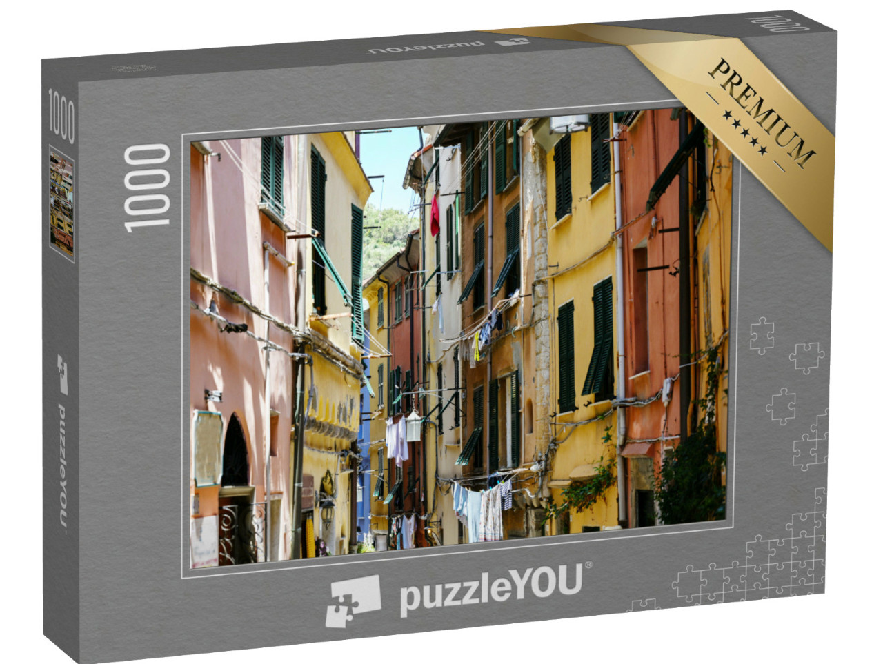 Puzzle 1000 pezzi „Porto Venere in Italia, tipica via del centro storico con case colorate e fili del bucato“