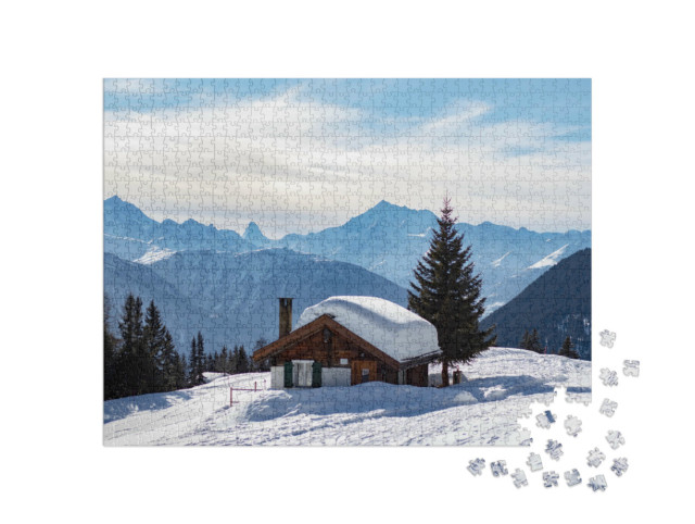 Puzzle 1000 pezzi „Rifugio innevato sulle Alpi svizzere“