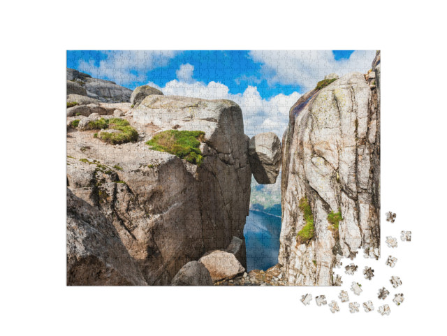 Puzzle 1000 pezzi „Kjeragbolten: Punto di riferimento sul monte Kjerag, Norvegia“