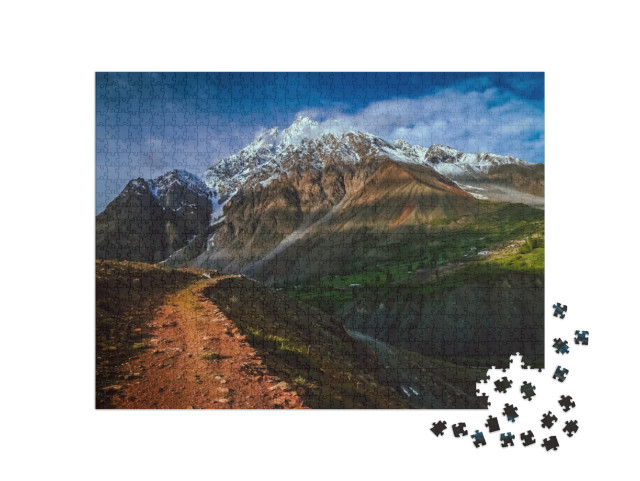 Puzzle 1000 pezzi „Affascinante paesaggio montano al passo di Shandur, Pakistan“