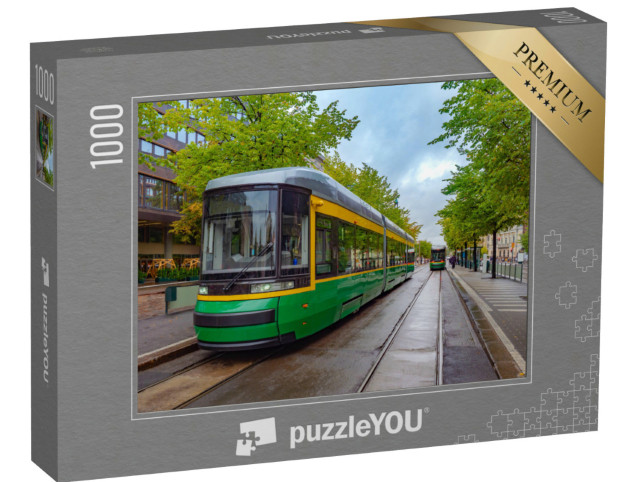 Puzzle 1000 pezzi „Un moderno tram in strada a Helsinki, Finlandia“
