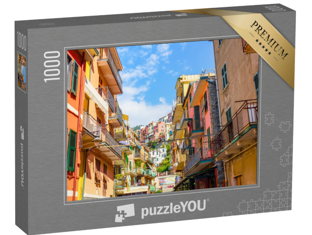 Puzzle 1000 pezzi „Vista delle case colorate lungo la via principale in una giornata di sole a Manarola“