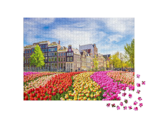 Puzzle 1000 pezzi „Bellissimi edifici antichi e tulipani ad Amsterdam, Paesi Bassi“