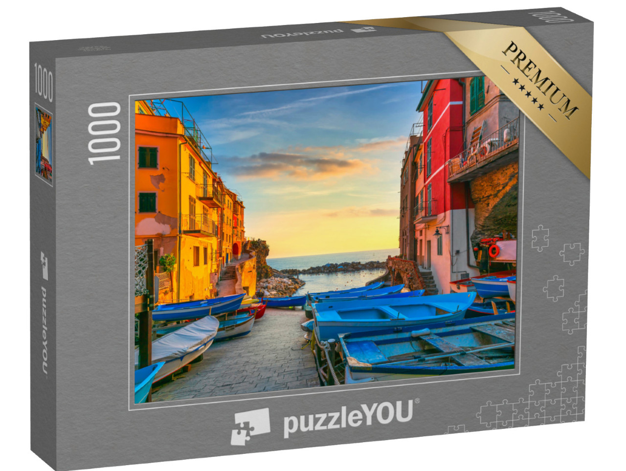 Puzzle 1000 pezzi „Strada del villaggio di Riomaggiore, barche e mare in Cinque Terre al tramonto“