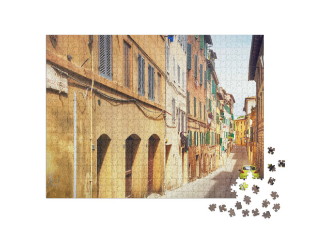 Puzzle 1000 pezzi „Vista della strada di una piccola città a Siena, Italia“