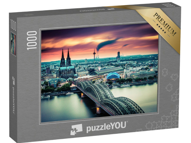 Puzzle 1000 pezzi „Tramonto e nuvole in movimento su Colonia, Germania“