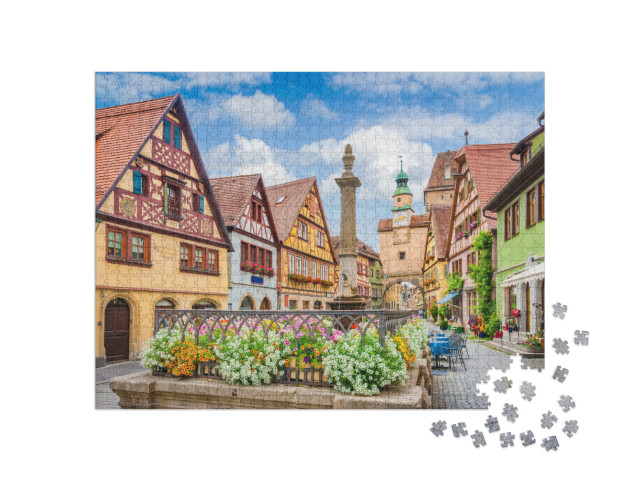 Puzzle 1000 pezzi „Rothenburg ob der Tauber in estate con un cielo azzurro“