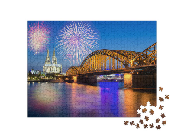 Puzzle 1000 pezzi „Fuochi d'artificio di Capodanno presso la Cattedrale di Colonia con il ponte Hohenzollern“