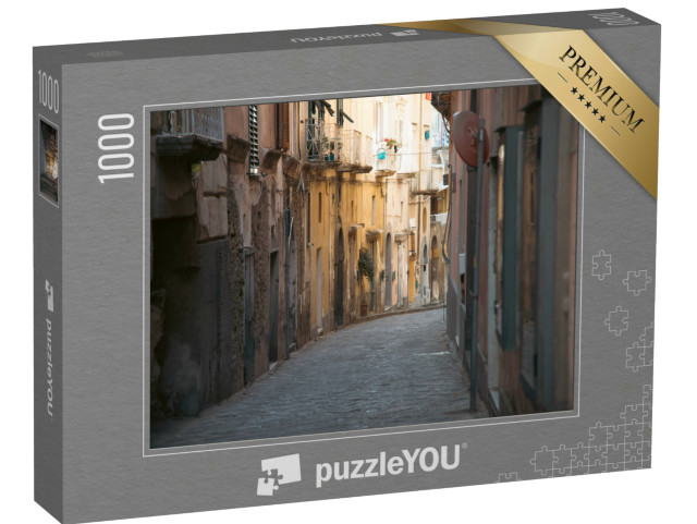 Puzzle 1000 pezzi „L'isola di Procida con le case colorate nella strada di una piccola città“