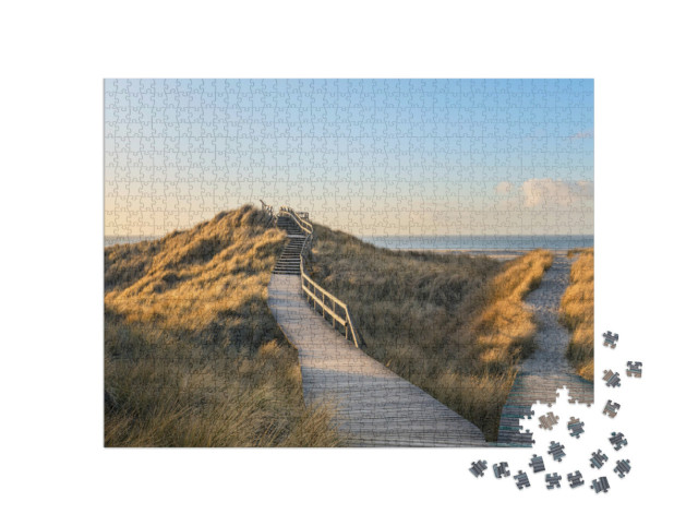 Puzzle 1000 pezzi „Passerella di legno tra le dune fino alla spiaggia di Norddorf, Amrum“