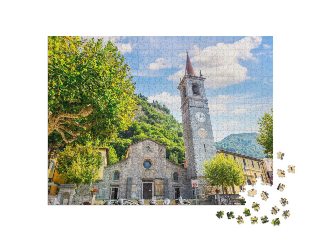 Puzzle 1000 pezzi „Chiesa di San Giorgio a Varenna in una soleggiata giornata estiva, Italia“