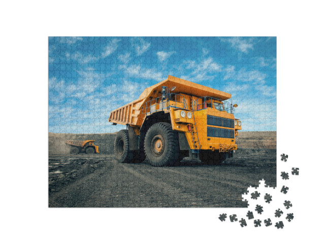 Puzzle 1000 pezzi „Dumper arancione che carica carbone nella cava“