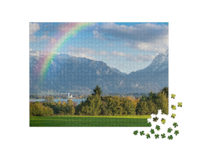 Puzzle 1000 pezzi „Panorama autunnale con arcobaleno sul Forggensee“
