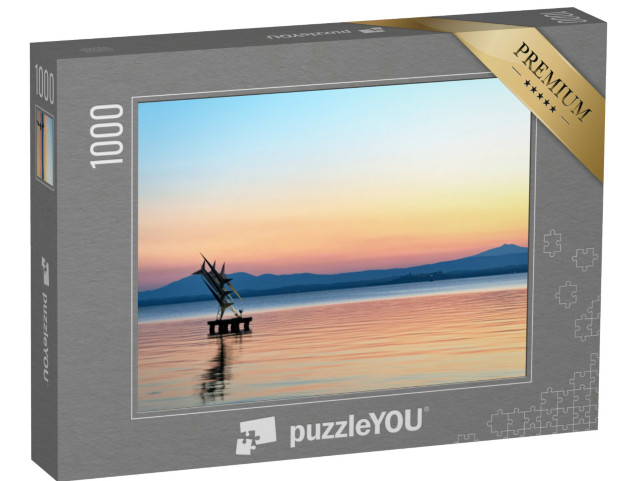Puzzle 1000 pezzi „Italia, regione Umbria, Lago Trasimeno. Città di Passignano sul Trasimeno. Tramonto sul lago.“