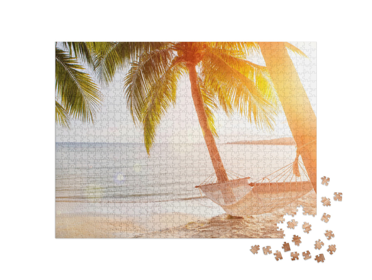 Puzzle 1000 pezzi „Amaca su una palma al tramonto“