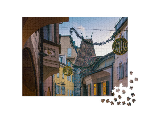 Puzzle 1000 pezzi „Un'atmosfera armoniosa, che riempie il centro storico di Merano durante il periodo natalizio.“