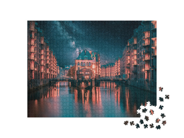 Puzzle 1000 pezzi „La Via Lattea sopra il quartiere illuminato dei magazzini di Amburgo“