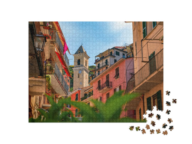 Puzzle 1000 pezzi „Case colorate nel centro storico con vista sul campanile della Chiesa di San Lorenzo, Manarola“