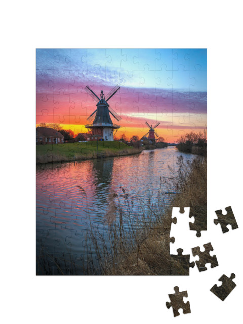 Puzzle 100 pezzi „I mulini gemelli di Greetsiel, Frisia orientale, all'alba“