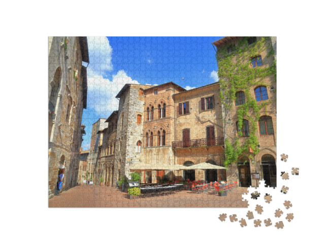 Puzzle 1000 pezzi „Edifici medievali in Piazza della Cisterna, San Gimignano, regione Toscana, Italia“