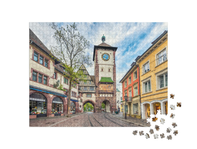Puzzle 1000 pezzi „La storica Schwabentor a Friburgo in Brisgovia, Germania“