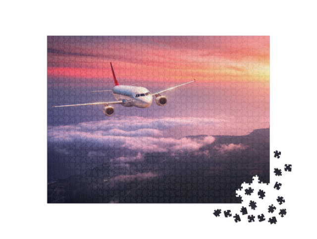 Puzzle 1000 pezzi „Aereo passeggeri in volo nel cielo rosso della sera“