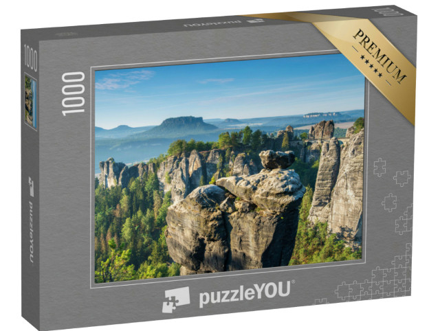 Puzzle 1000 pezzi „Ponte di Bastei e formazioni rocciose nella Valle dell'Elba, Parco Nazionale della Svizzera Sassone“