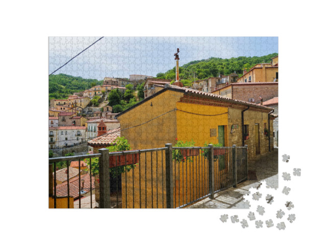 Puzzle 1000 pezzi „Castelmezzano, l'antico borgo immerso nei tipici panorami delle Dolomiti Lucane“