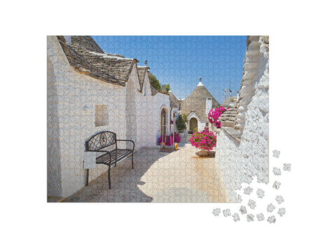 Puzzle 1000 pezzi „Strada di Trulli tradizionali ad Alberobello, Italia“