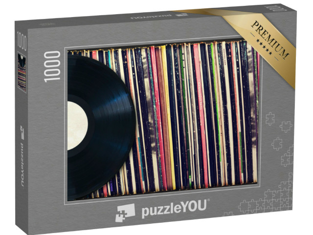 Puzzle 1000 pezzi „Disco in vinile davanti a una collezione di album“