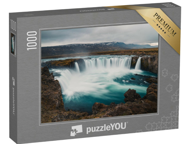 Puzzle 1000 pezzi „Godafoss: la famosa cascata islandese, vista dalla riva rocciosa“