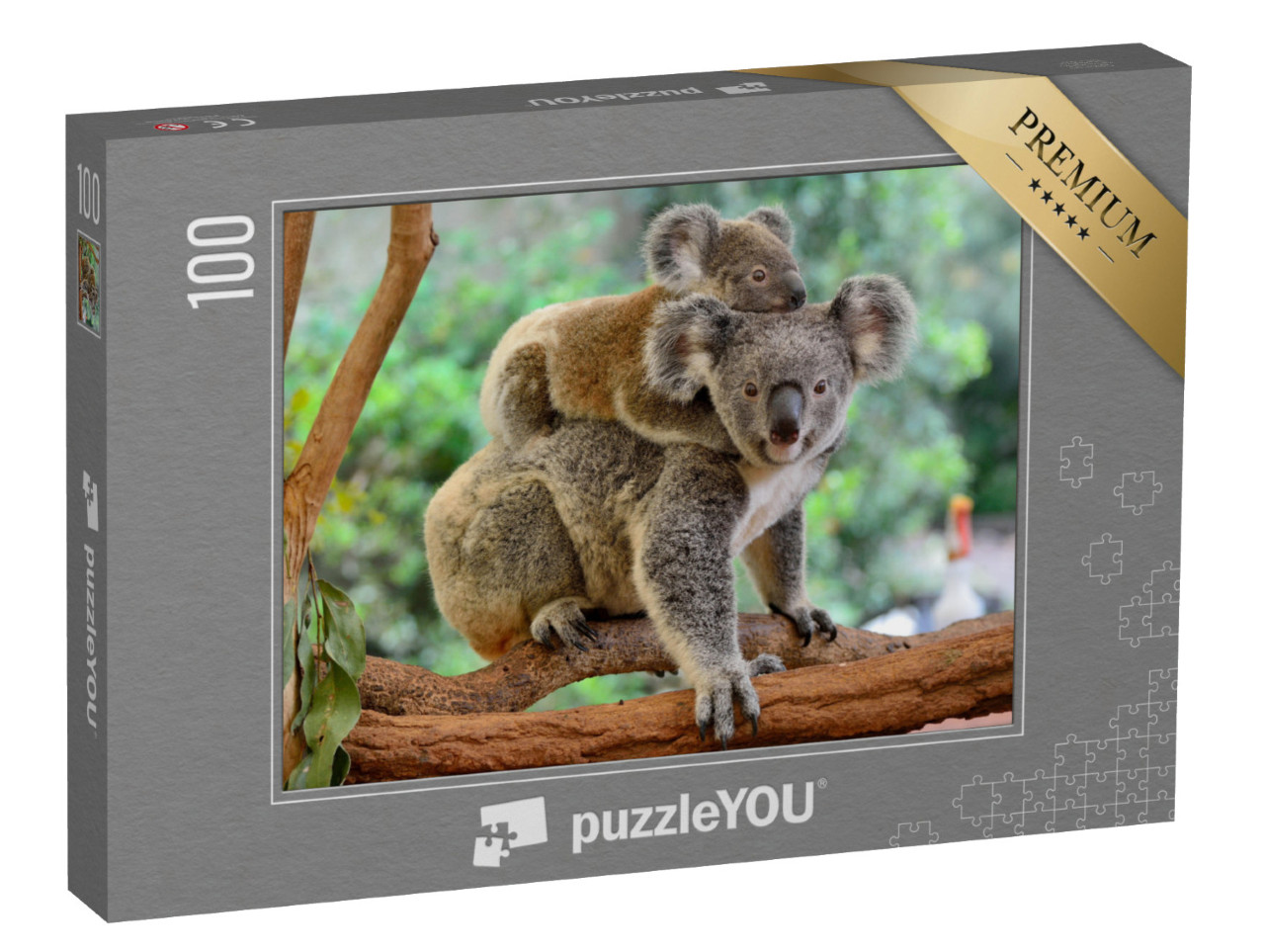 Puzzle 100 pezzi „Madre koala con il piccolo sulla schiena su un albero di eucalipto“