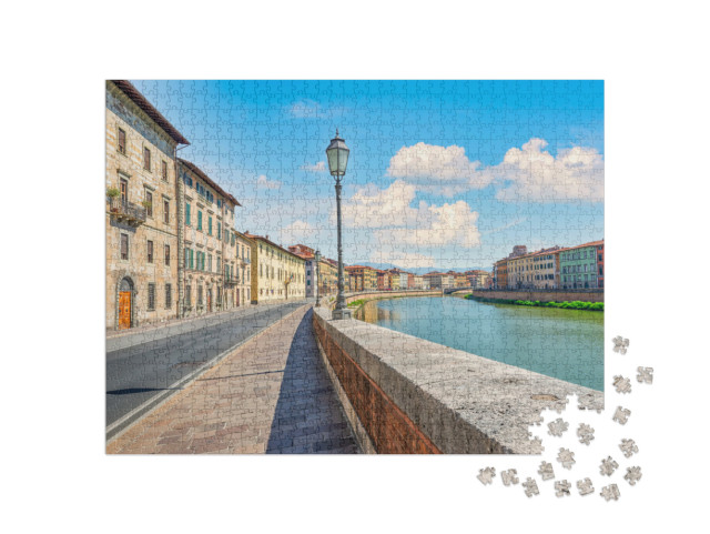 Puzzle 1000 pezzi „Argine su una sponda dell'Arno a Pisa, Italia“