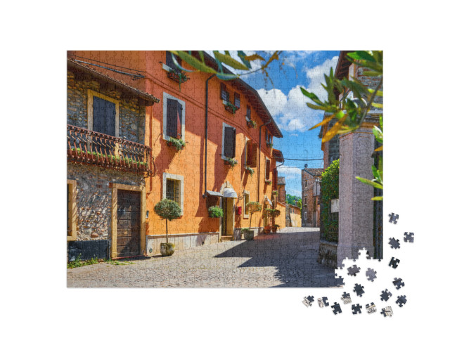 Puzzle 1000 pezzi „Borghetto Valeggio sul Mincio, Verona, Italia. Tradizionale villaggio italiano con vecchie case colorate“